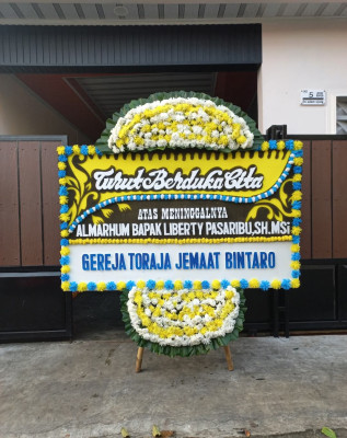 Papan Bunga Duka di Jaya